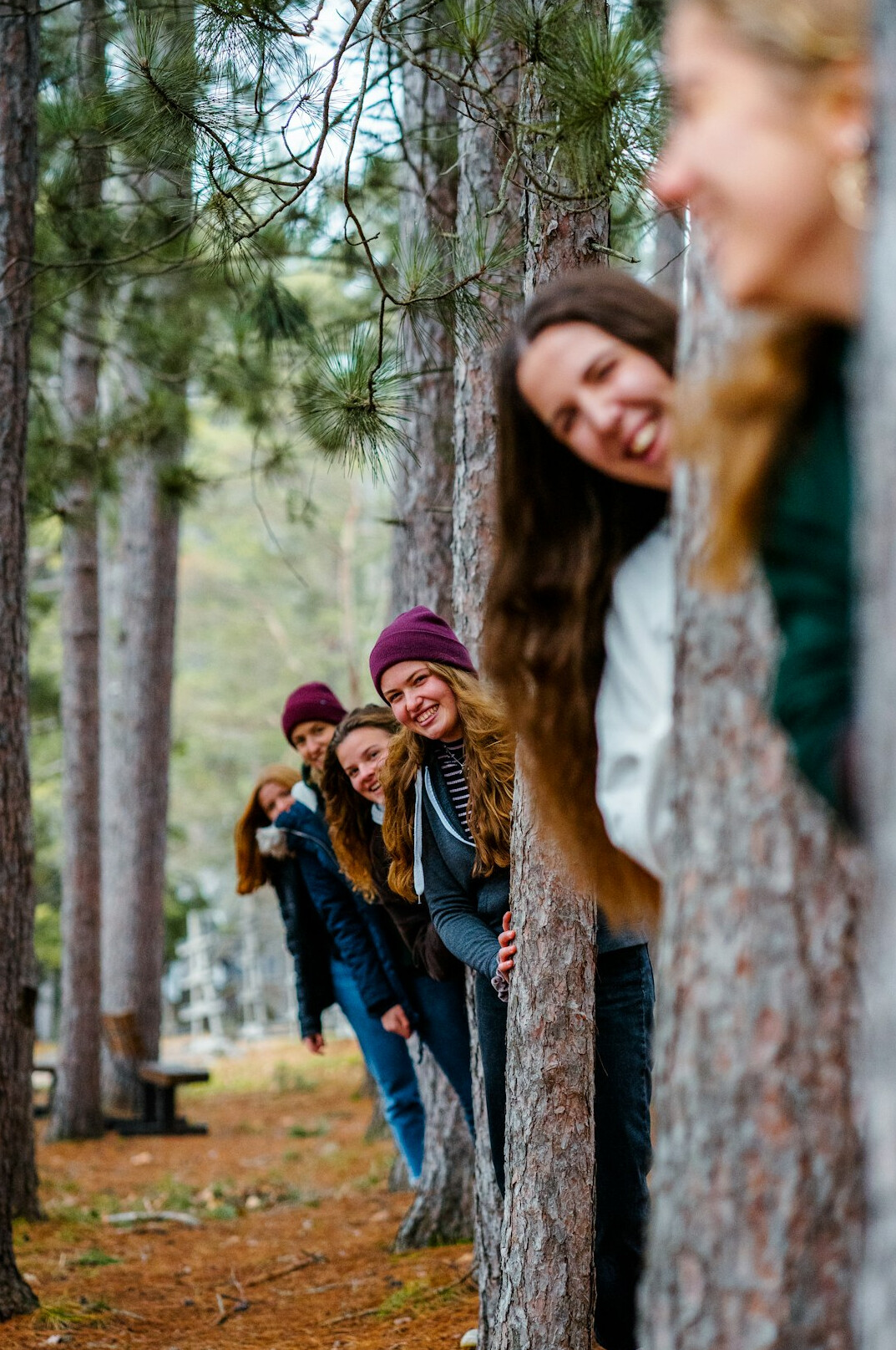 Group of friends laughing together outdoors